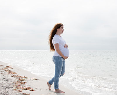 pregnant woman on the beach in Florida